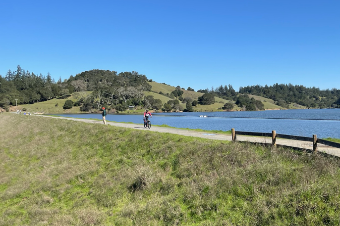 Hiker and biker recreating at Bon Tempe Lake